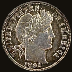 Obverse and reverse of an 1892 Barber dime showing Liberty in a cap and a wreath around ONE DIME.