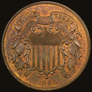 Obverse of an 1865 two-cent piece showing a Union shield with the motto IN GOD WE TRUST.