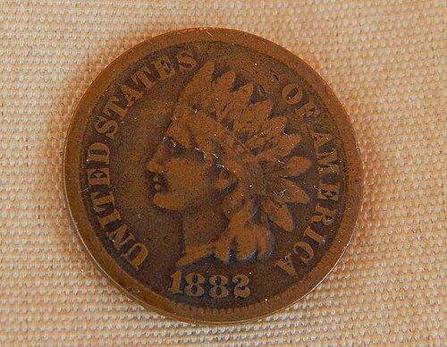 A Very Good coin: heavy wear, outlines and lettering still show.