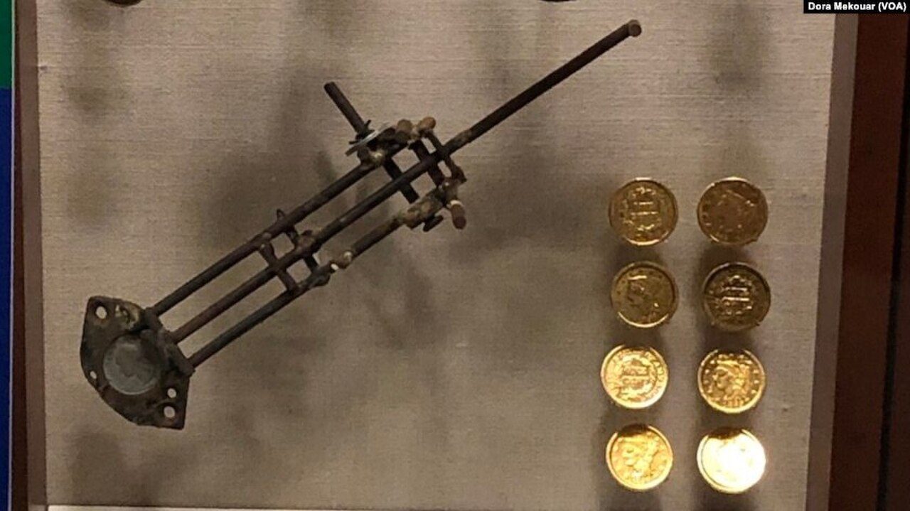 Counterfeiting equipment and fake ten dollar gold coins displayed at the U.S. Secret Service Museum