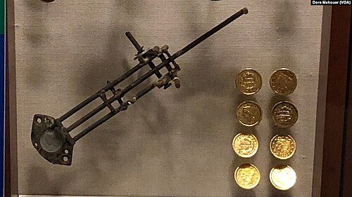Counterfeiting tools and fake $10 gold coins (U.S. Secret Service Museum).