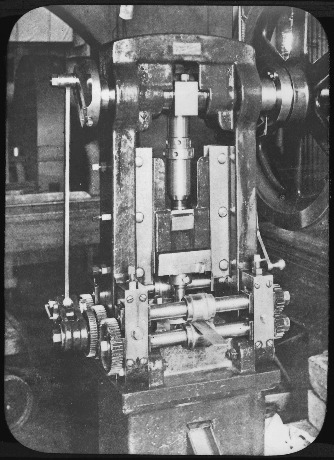 U.S. Mint punching machine cutting round blanks from a strip of metal
