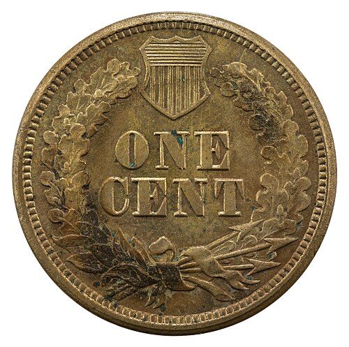 Reverse of an 1860 Indian Head cent showing an oak wreath topped by a shield around ONE CENT.